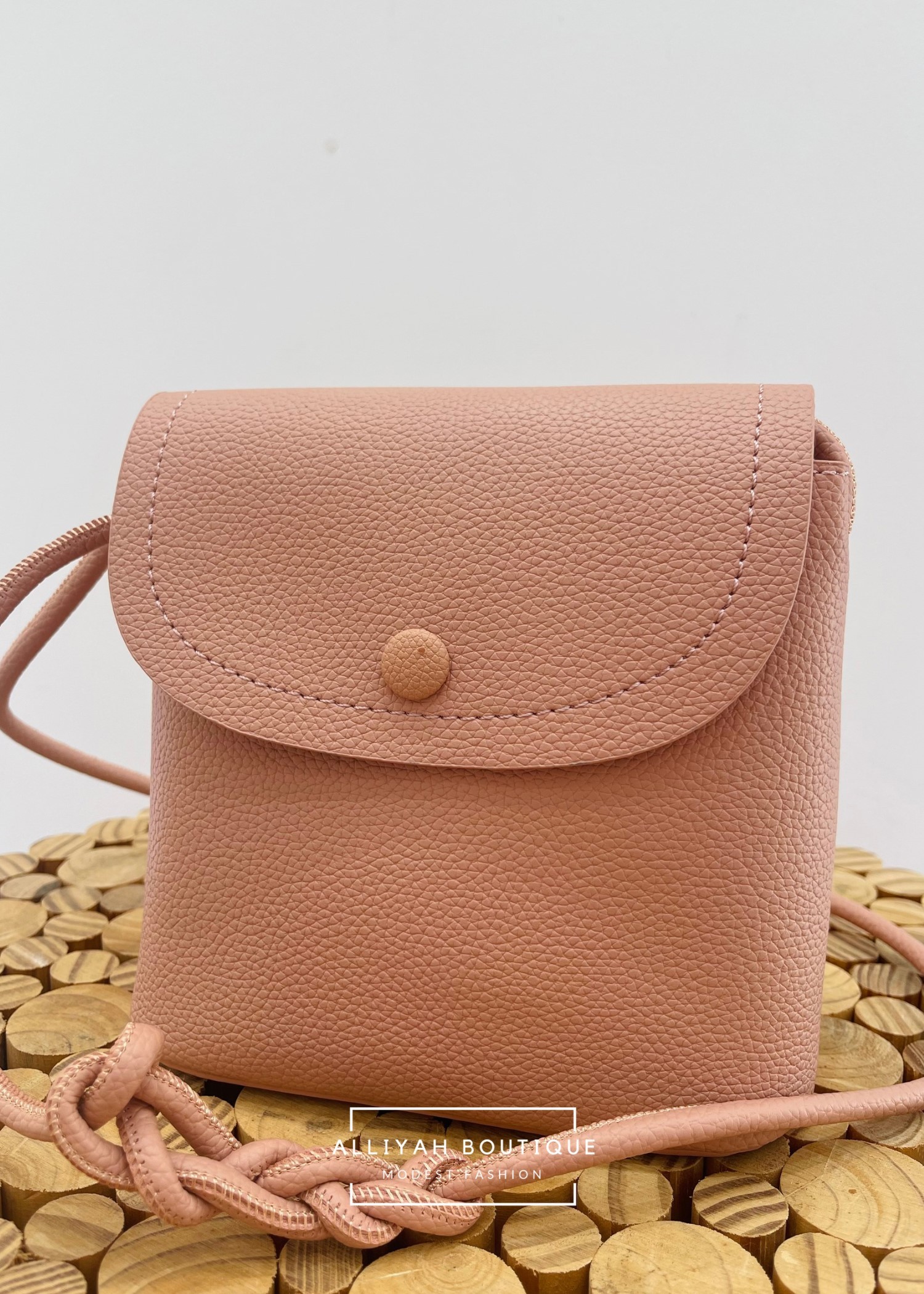 Sac tressé rose
