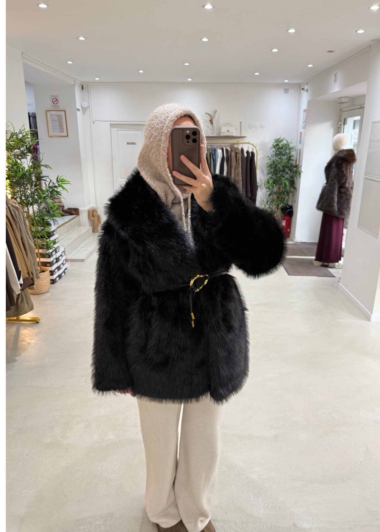 Manteau fourrure noir